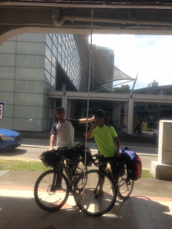 Blogger and friend with assembled bicycles