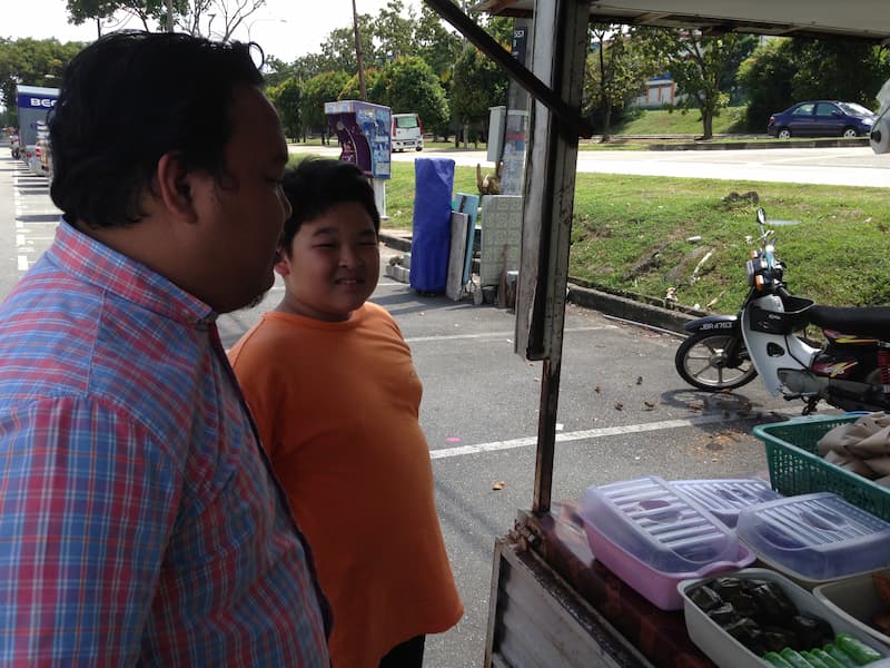 Boy with Malaysia food truck