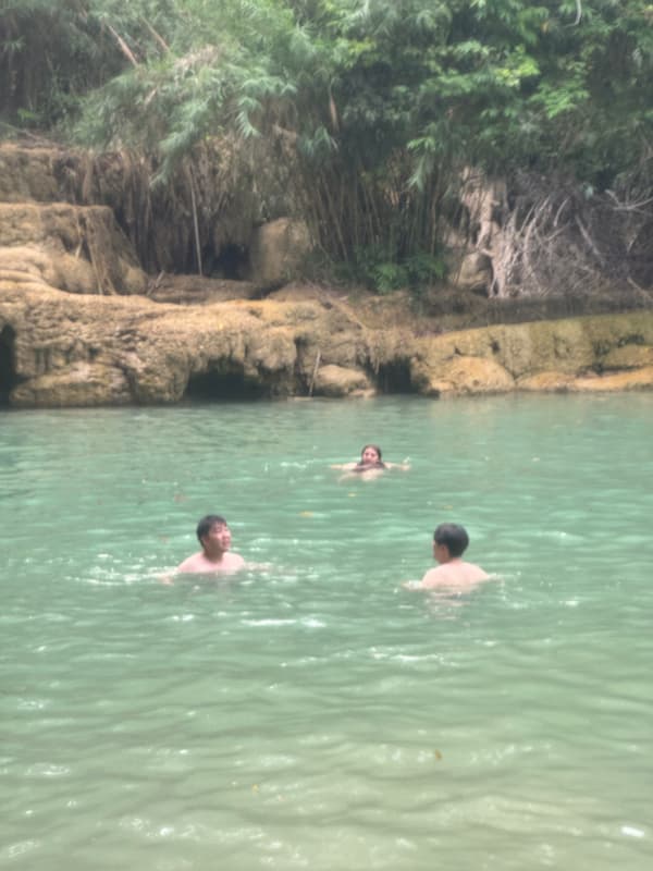 Blogger and friend in Kuang Si waterfall