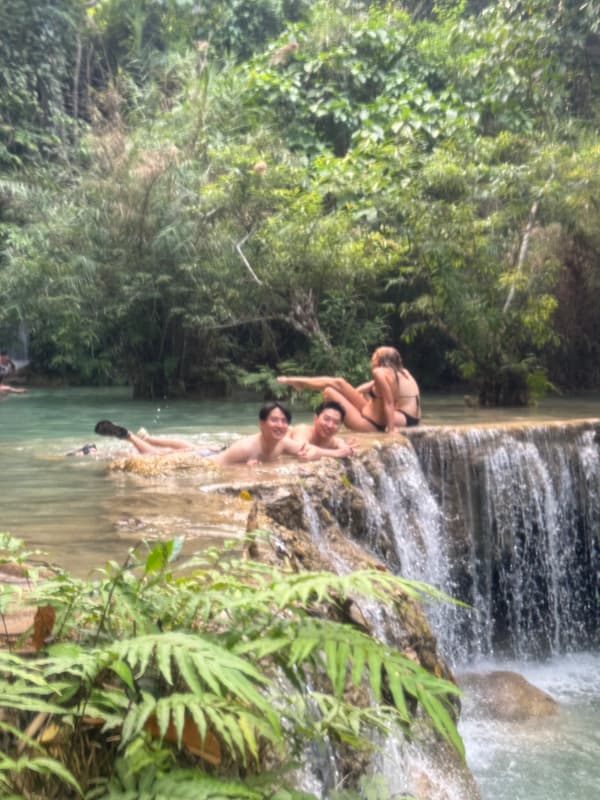 Friends in Kuang Si waterfall