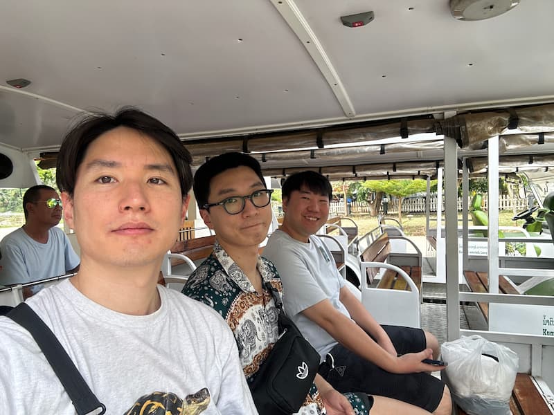 The group photo on the electric shuttle cart
