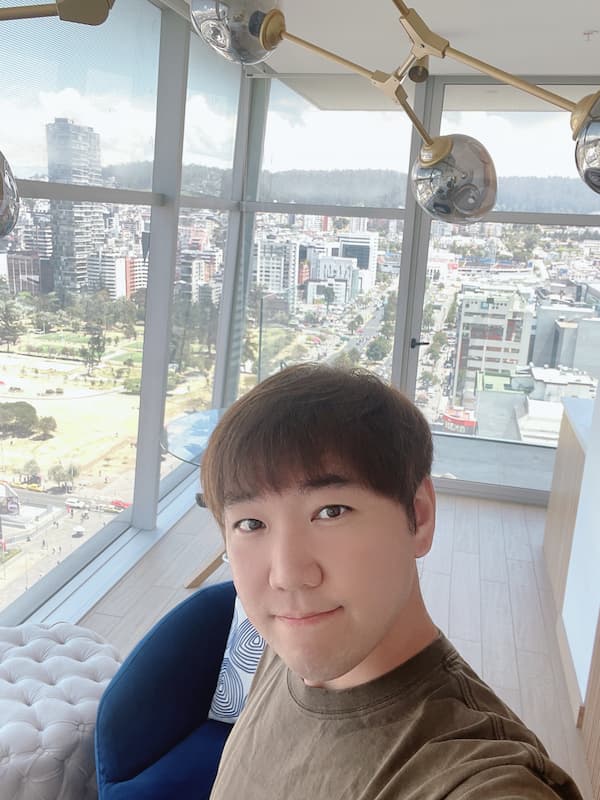 Blogger taking selfie at home