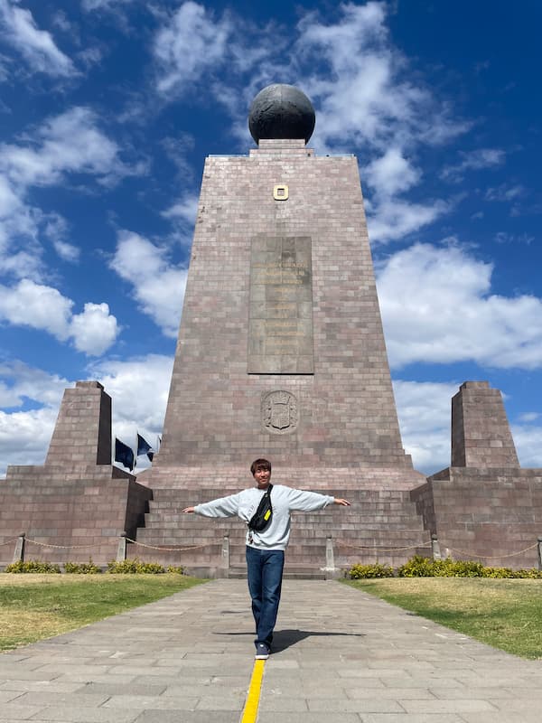 Blogger standing on the equator