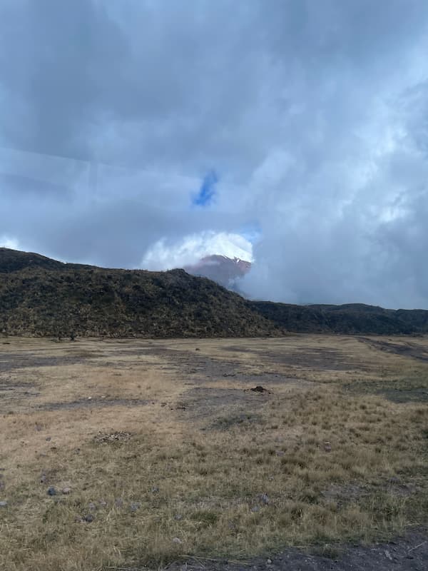 Cotopaxi Volcano peeking through the clouds